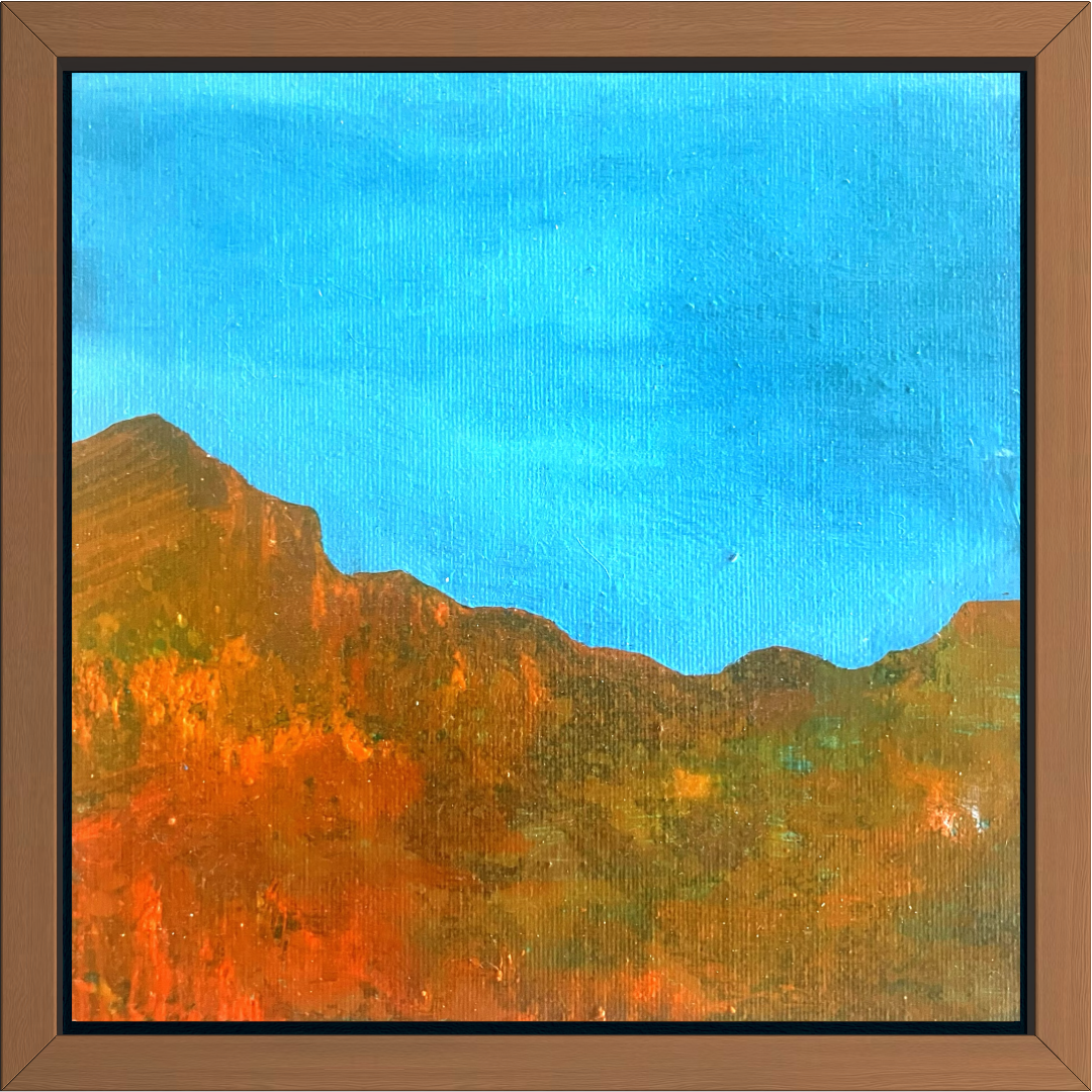 Blue sky, orange cliffs